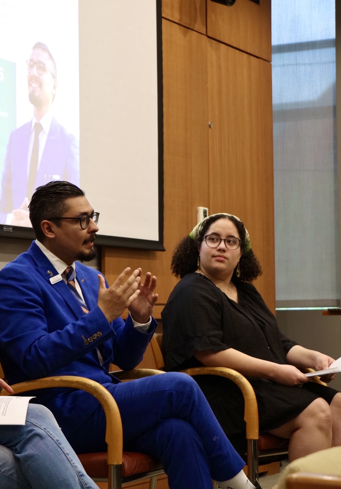 Mayoral candidate David Morales leads a disussion with Ortiz Alvarez.