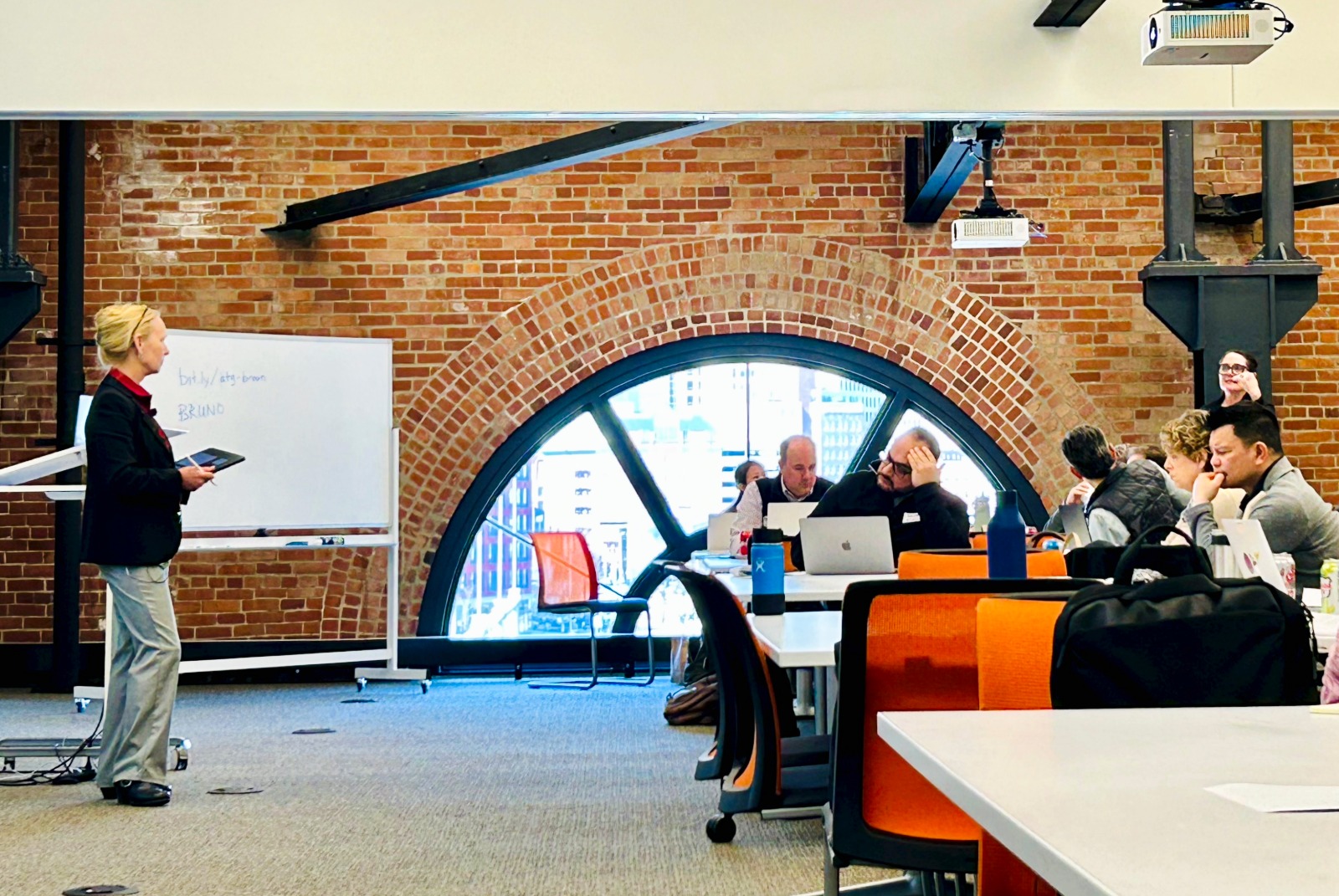 Faculty gathered in the SSL Multifunction Room to learn about fundraising strategies from a presenter.