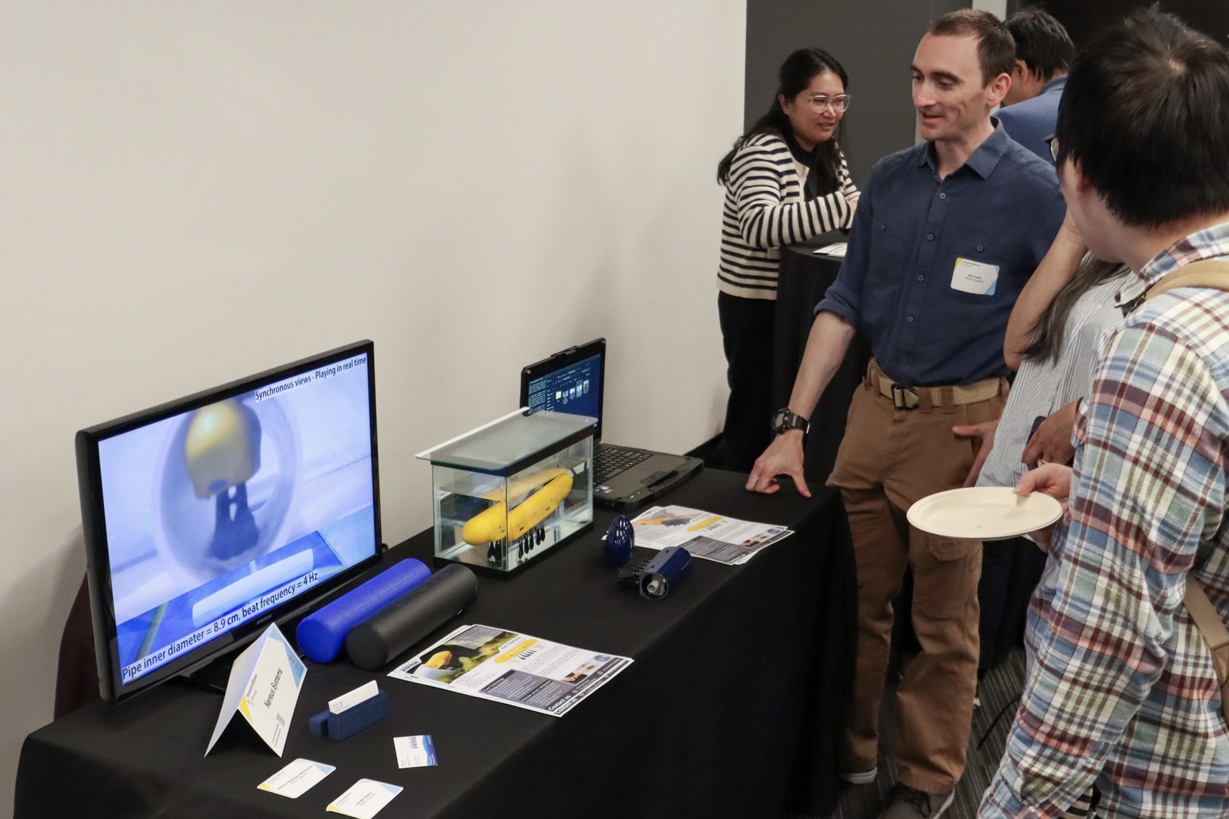 Nereus Systems displays their propeller-free underwater inspection robot.