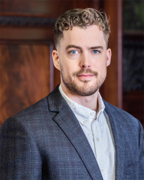 A headshot of Brendan Keith