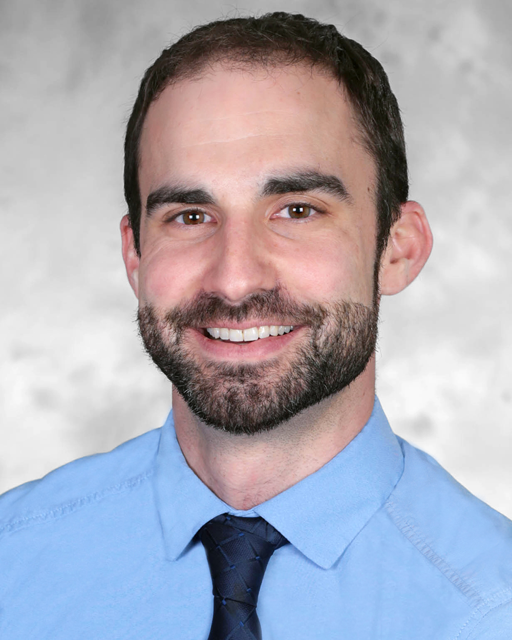 A headshot of Justin Berk