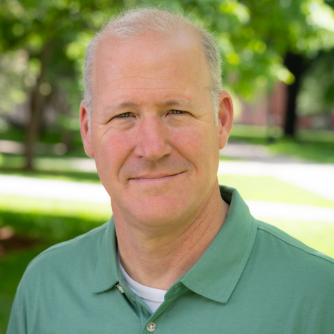 A headshot of Robert Wilson